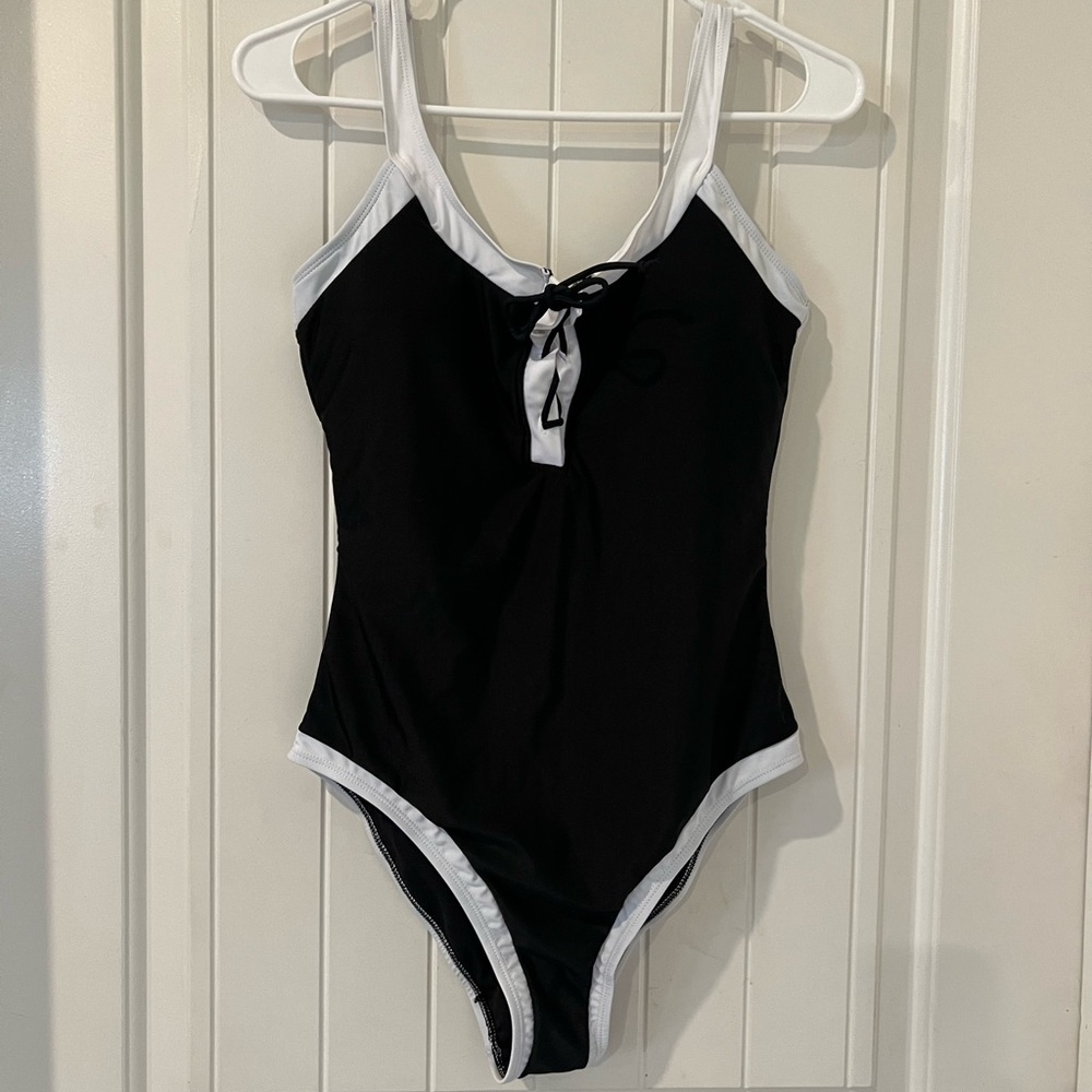 Pink Lily Black and White Woman’s Swim One Piece